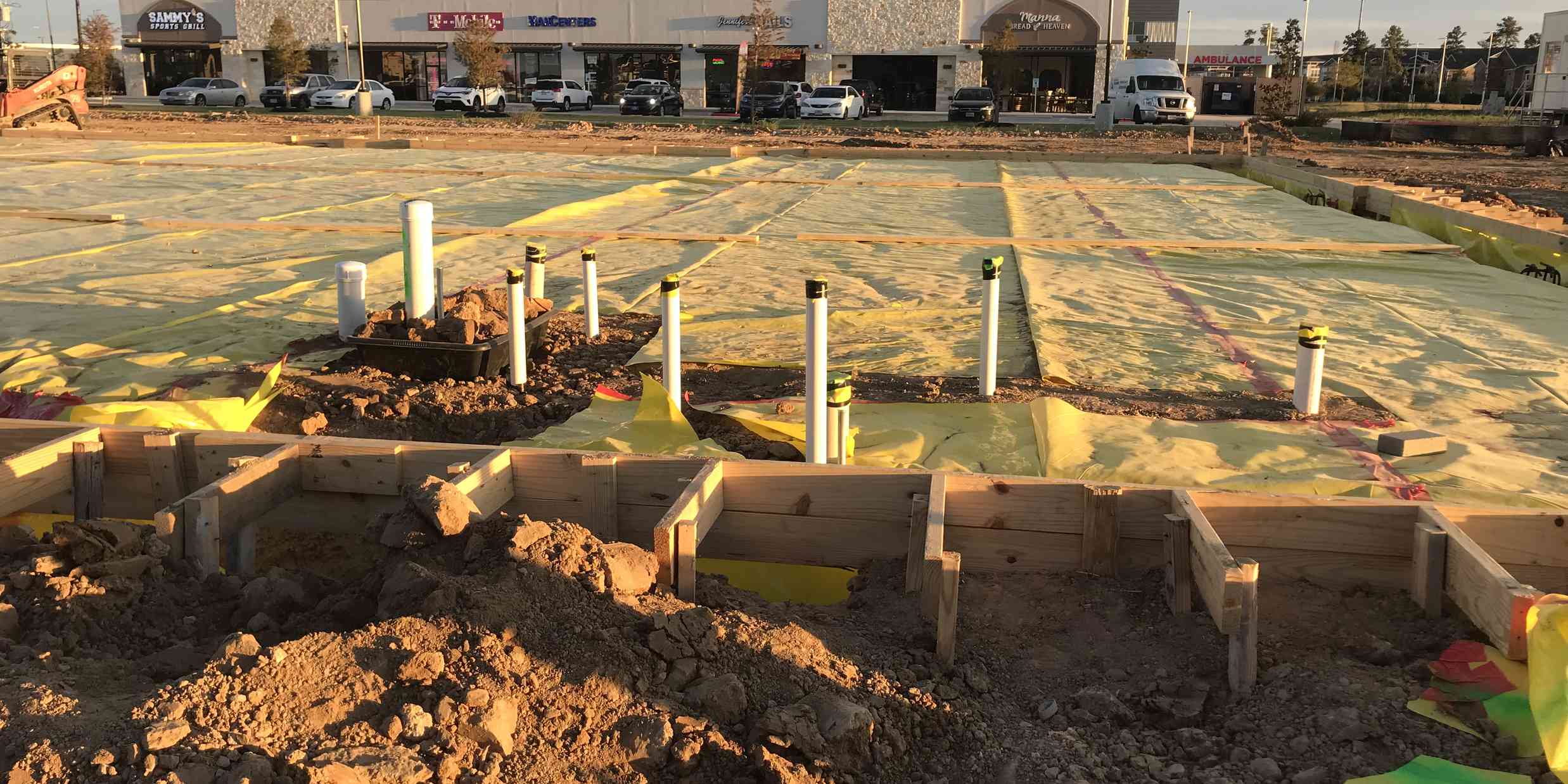 Commercial HVAC rough-in foundation and utility piping installation in Tomball, TX